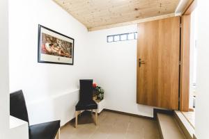 TV a/nebo společenská místnost v ubytování Hostel u Arény