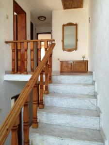 a staircase in a house with a mirror at Apartment Marchela in Nesebar