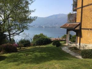 a house with a view of a lake at Suite Ananda in Verbania