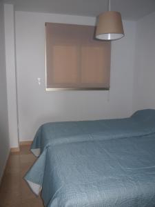 Posteľ alebo postele v izbe v ubytovaní Vila Paradis 11C