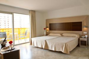 Postel nebo postele na pokoji v ubytování Hotel & SPA Dynastic
