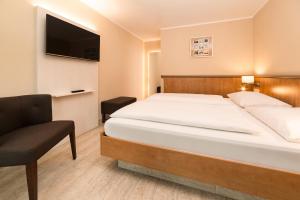 Postel nebo postele na pokoji v ubytování Hotel Spree-idyll