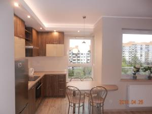 Kuchyňa alebo kuchynka v ubytovaní Apartament w Gdańsku blisko morza