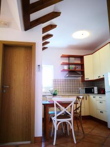 Kuchyňa alebo kuchynka v ubytovaní Apartment Maria Di