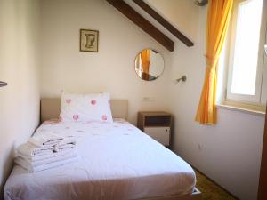 Posteľ alebo postele v izbe v ubytovaní Apartment Maria Di