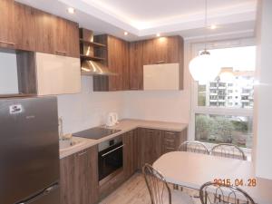 Kuchyňa alebo kuchynka v ubytovaní Apartament w Gdańsku blisko morza