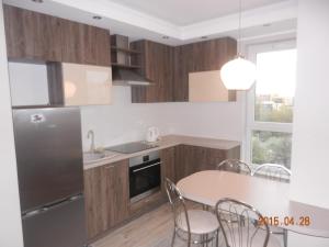 Kuchyňa alebo kuchynka v ubytovaní Apartament w Gdańsku blisko morza