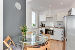 Kuchyňa alebo kuchynka v ubytovaní Gdańsk Comfort Apartments Wejhera
