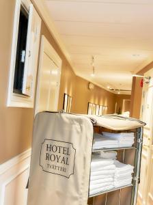 Katil atau katil-katil dalam bilik di Hotel Royal