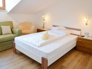 Postel nebo postele na pokoji v ubytování Hotel Karin