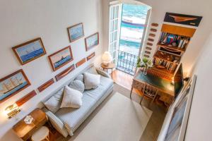 A seating area at ALTIDO Stylish Seaview Apartment in Portofino