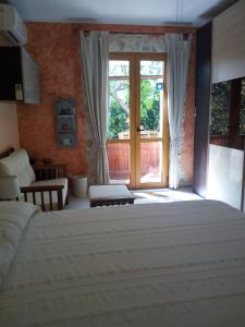 Cama ou camas em um quarto em B&B Villa Sul Golfo