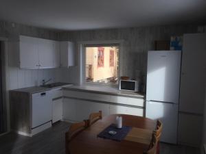 Virtuvė arba virtuvėlė apgyvendinimo įstaigoje Senja Skaland