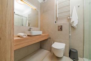 Kúpeľňa v ubytovaní Apartamenty PORTO