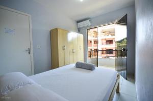 Cama ou camas em um quarto em Residencial San Jorge