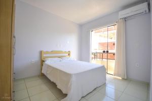 Cama ou camas em um quarto em Residencial San Jorge