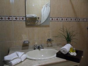 Koupelna v ubytování Hotel Suite Azomali