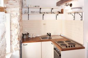 Kuchyň nebo kuchyňský kout v ubytování Apartments Lufra Skradin