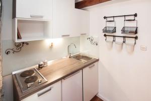 Kuchyň nebo kuchyňský kout v ubytování Apartments Lufra Skradin