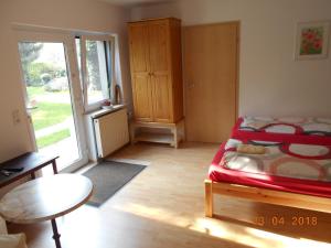 Ein Bett oder Betten in einem Zimmer der Unterkunft Pension "Am Schloß"