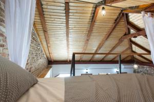 Postel nebo postele na pokoji v ubytování Apartments Pepi
