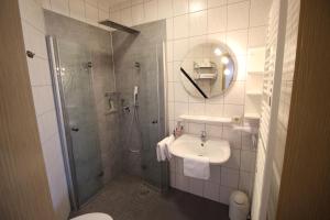 Koupelna v ubytování Appartements Leibold + 29 fotografií