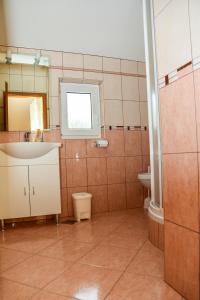 Kylpyhuone majoituspaikassa Apartments Toska