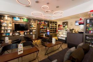TV a/nebo společenská místnost v ubytování Best Western Plus Panama Zen Hotel