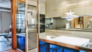 Kuchyňa alebo kuchynka v ubytovaní BizFlats Eixample Apartments