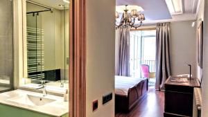 Kúpeľňa v ubytovaní BizFlats Eixample Apartments + 37 fotografií