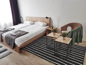 Postel nebo postele na pokoji v ubytování Arhiv Boutique House