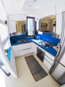 A kitchen or kitchenette at Leukasia