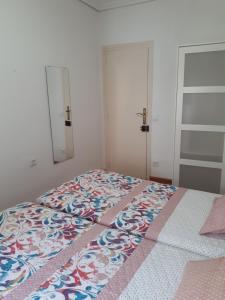 Postel nebo postele na pokoji v ubytování Casa Pueblo Alzira No Compartida