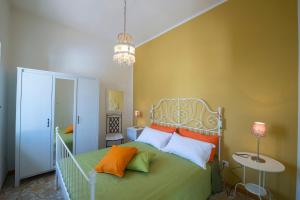 En eller flere senge i et værelse på Casa Pina