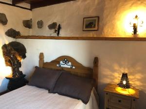 Postel nebo postele na pokoji v ubytování Casa Rural La Pagarrona
