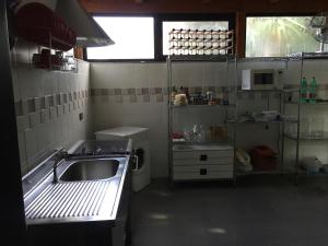 IN VILLA locazione breveにあるキッチンまたは簡易キッチン