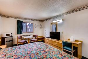 TV a/nebo společenská místnost v ubytování Motel 9