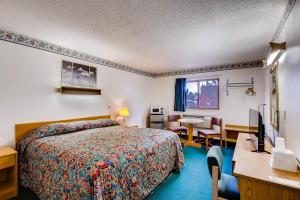 Postel nebo postele na pokoji v ubytování Motel 9