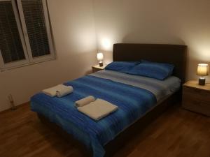 Lova arba lovos apgyvendinimo įstaigoje Apartment Misulino