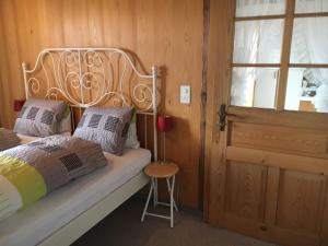 Llit o llits en una habitació de Appartement Fernsicht Triesenberg