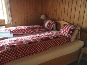 Llit o llits en una habitació de Appartement Fernsicht Triesenberg