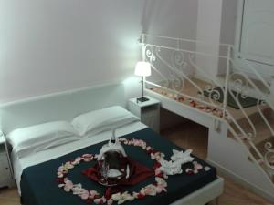 Postel nebo postele na pokoji v ubytování B&B Marebello
