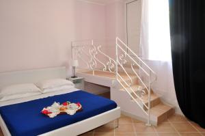 Postel nebo postele na pokoji v ubytování B&B Marebello