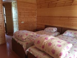 Кровать или кровати в номере Lahic Hostel