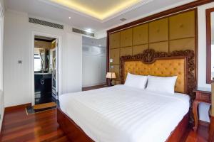Säng eller sängar i ett rum på Rung Huong Apartment