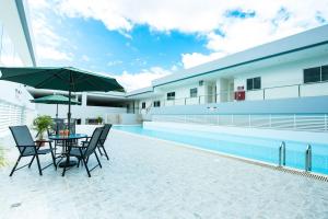 Bazén v ubytování Aman Hills Hotel nebo v jeho okolí