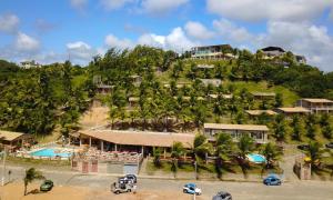 an aerial view of a resort on a hill at Chalemar Hotel Pousada in Baía Formosa