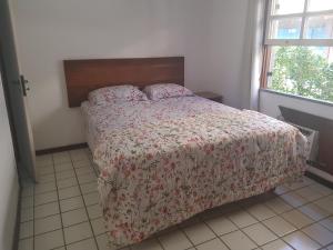 Cama ou camas em um quarto em Condominio Tahiti
