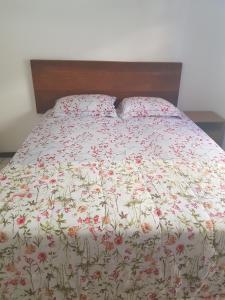 Cama ou camas em um quarto em Condominio Tahiti