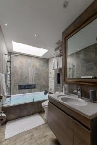 Um banheiro em Casa Las Palmas Hotel Boutique
